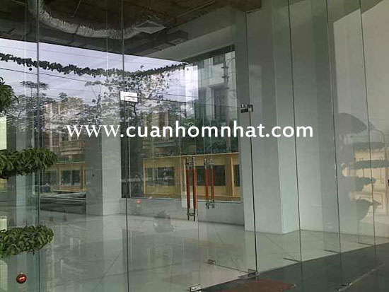 Cửa kính bản lề sàn quận 3
